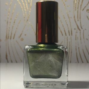 Metallic green nail polish